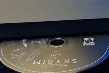 An image of the front of a PS4 Pro console, zoomed-in on the bluray drive slot.